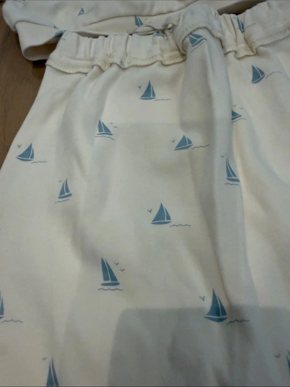 Oh baby! Cream Baby Two-Piece Set with Light Blue Sailboat Print